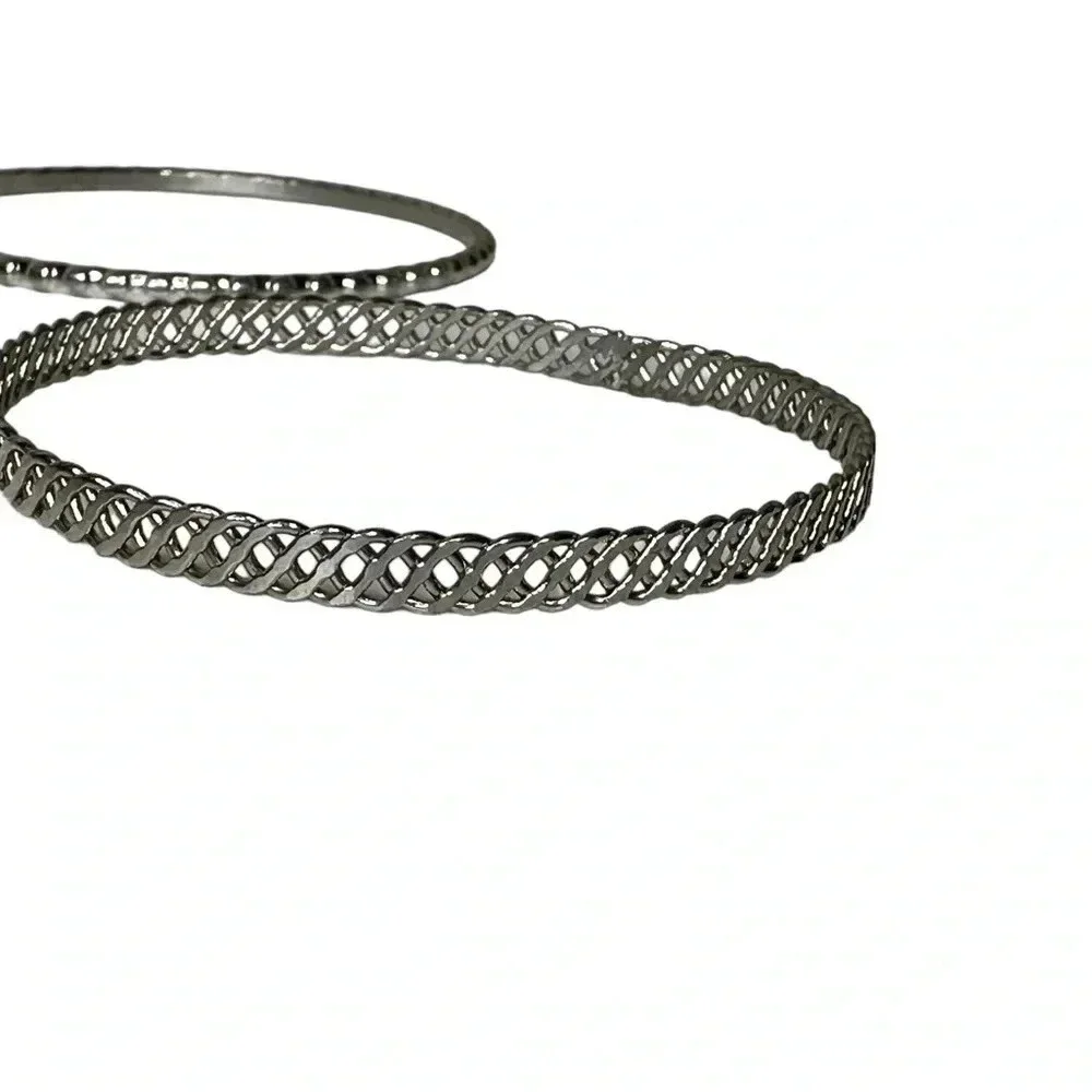 Set of 4 silver bangle bracelets